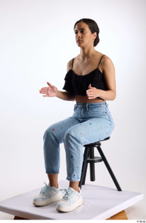 Jimena  1 black ruffled crop top blue embellished jeans…